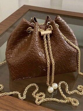 Woven Drawstring Bucket Bag with Gold Chain